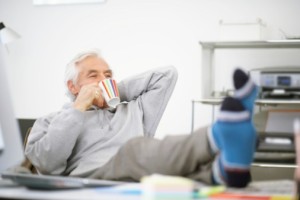 MAN FEET ON DESK