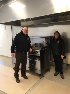 RM Flagg owners with stove