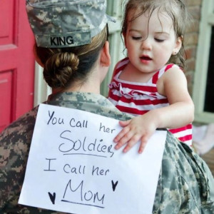 mom holding baby