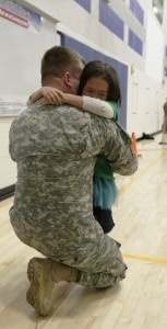 soldier with young daughter